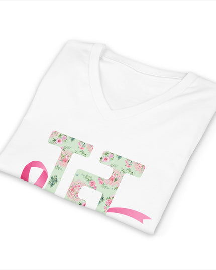Folded white breast cancer awareness V-neck t-shirt showing the floral HG logo and pink ribbon up close