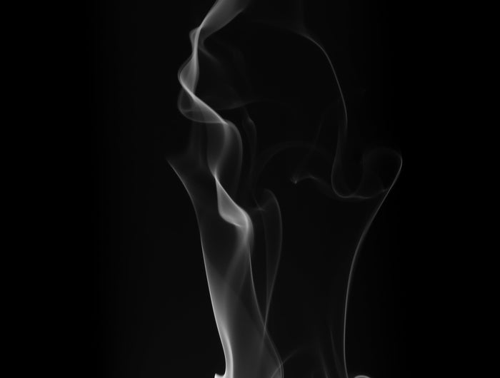 White smoke or fog effect on a black background